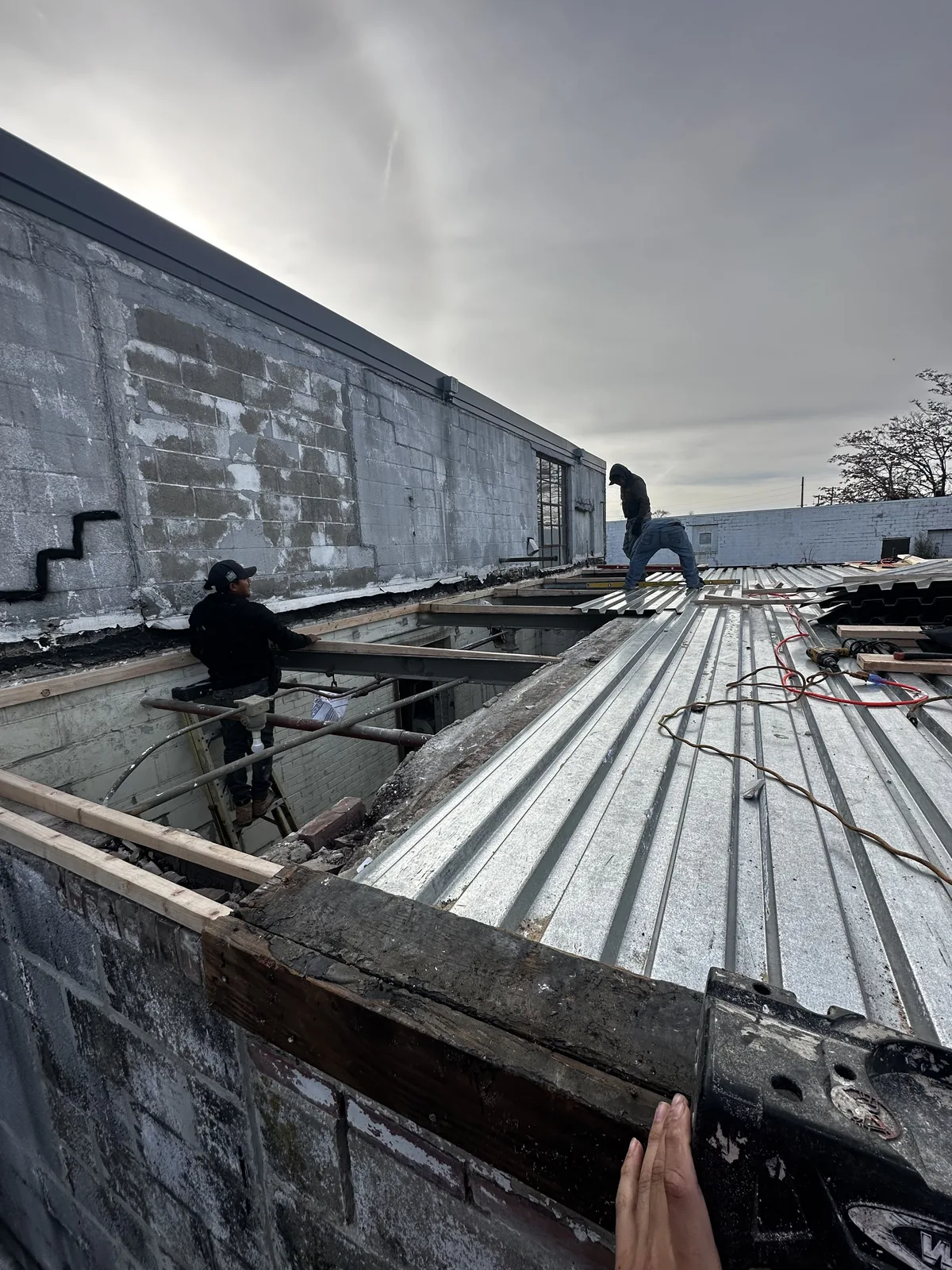 Commercial roof replacement work in progress