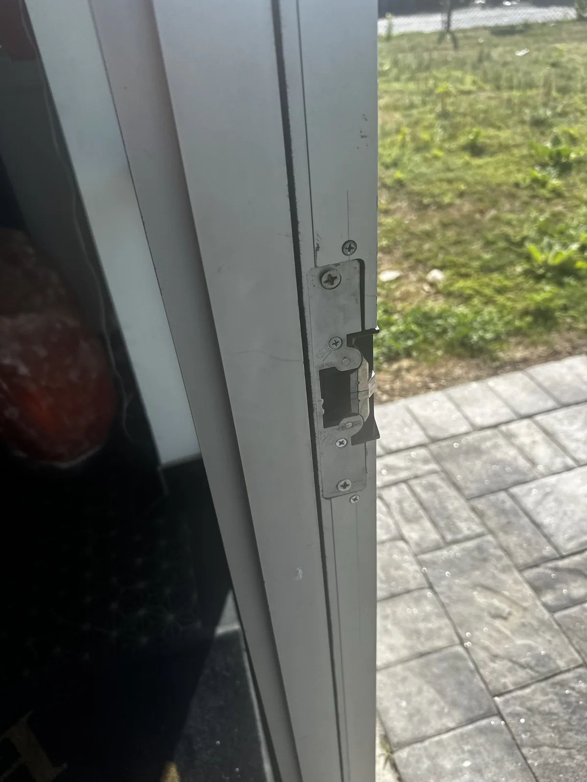 Installed access-control hardware at a commercial door