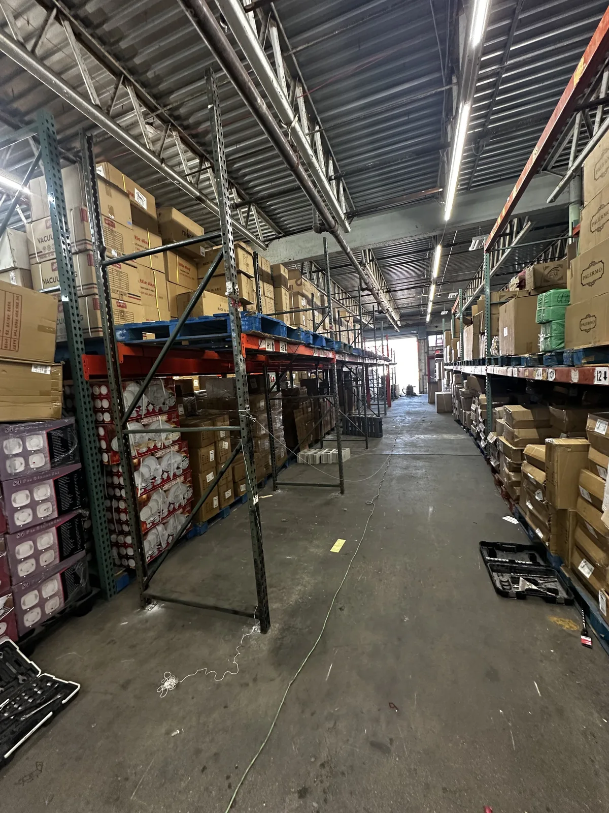 Warehouse shelving and storage improvements inside a commercial facility