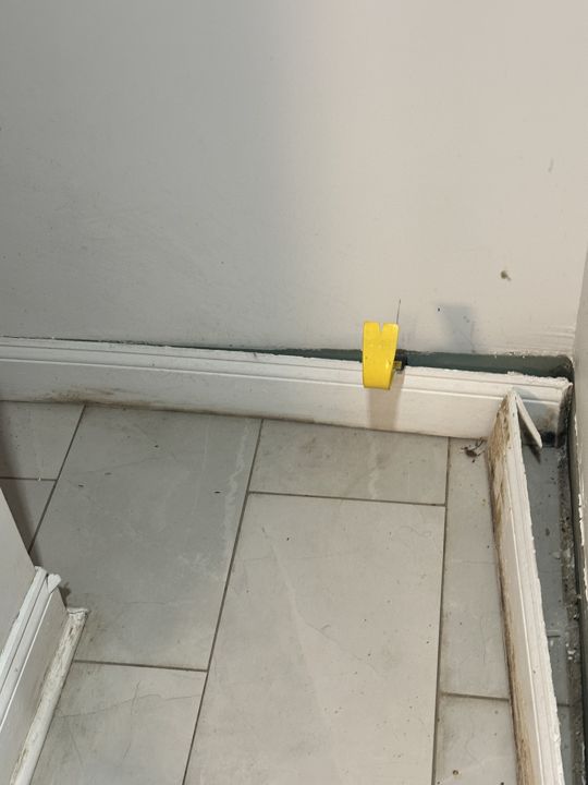 Wall base opened and checked before new baseboard.