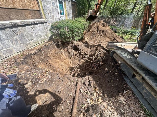 Underground tank excavation during residential site preparation