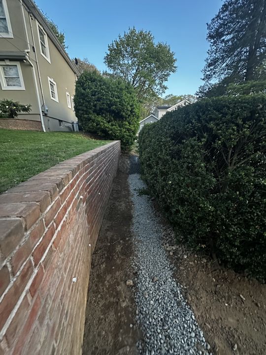 Finished gravel channel intercepting the runoff.
