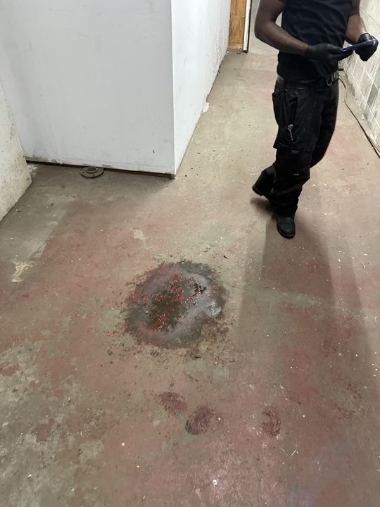 Floor staining used to trace the leak back to its source.